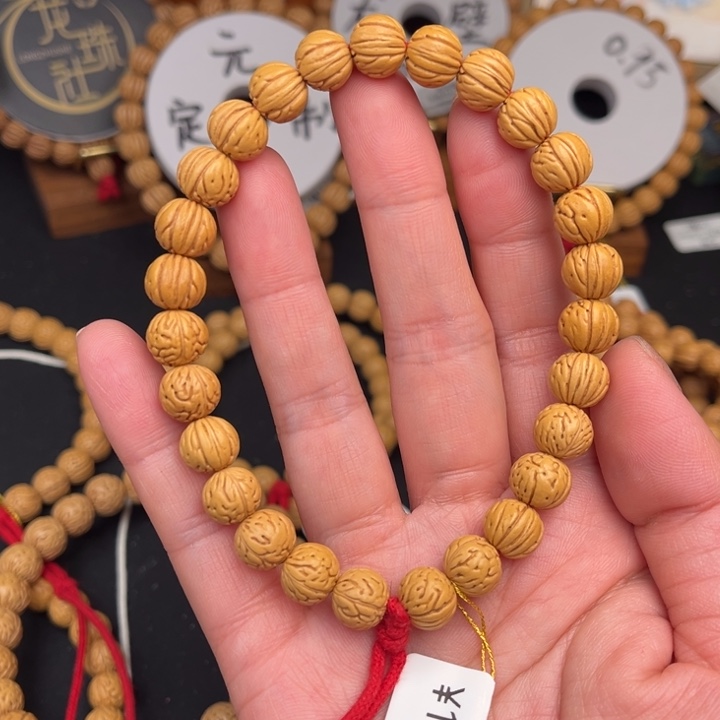 小***涛桃核手串凤鸾边尺10抛光27K尺寸误差0.5mm之间