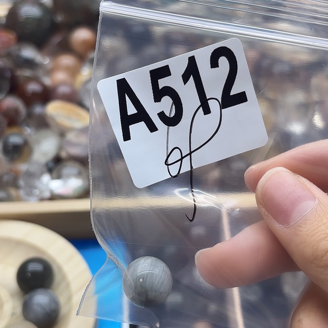 侯***词珠宝半成品紫晶未镶嵌512