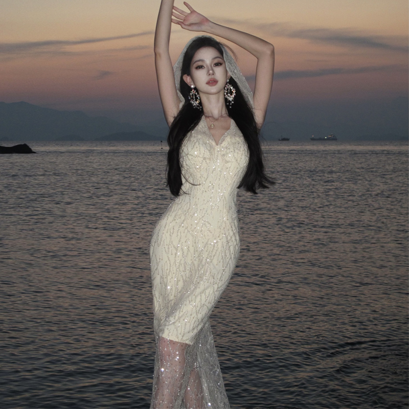 小众沙丘废土风亮片连衣裙女高级感连帽生日礼服海边度假气质长裙