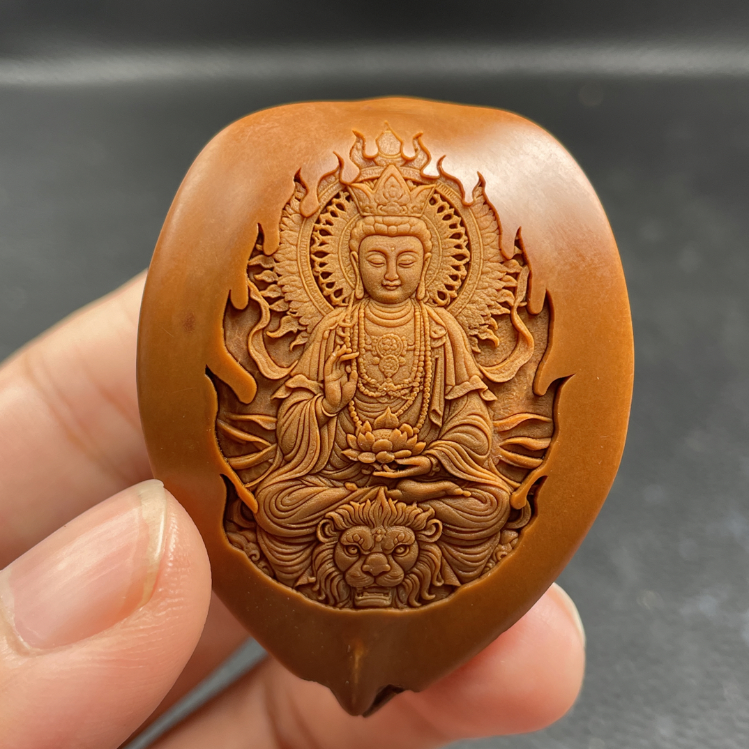 新款进口大橄榄核3.9观音手把件