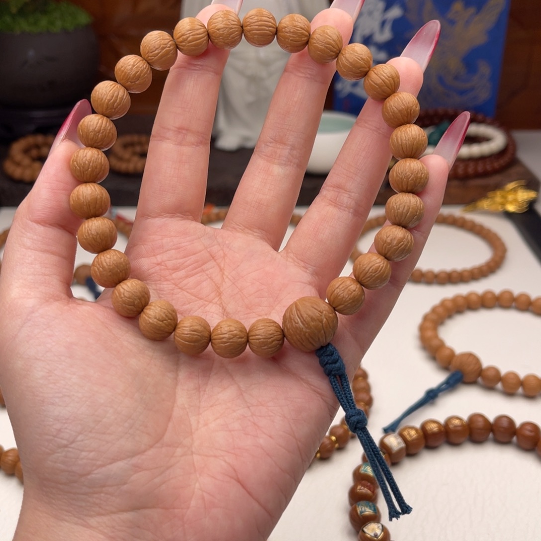 姜***胖猴头核桃吊坠凤羽 11小 误差0.2