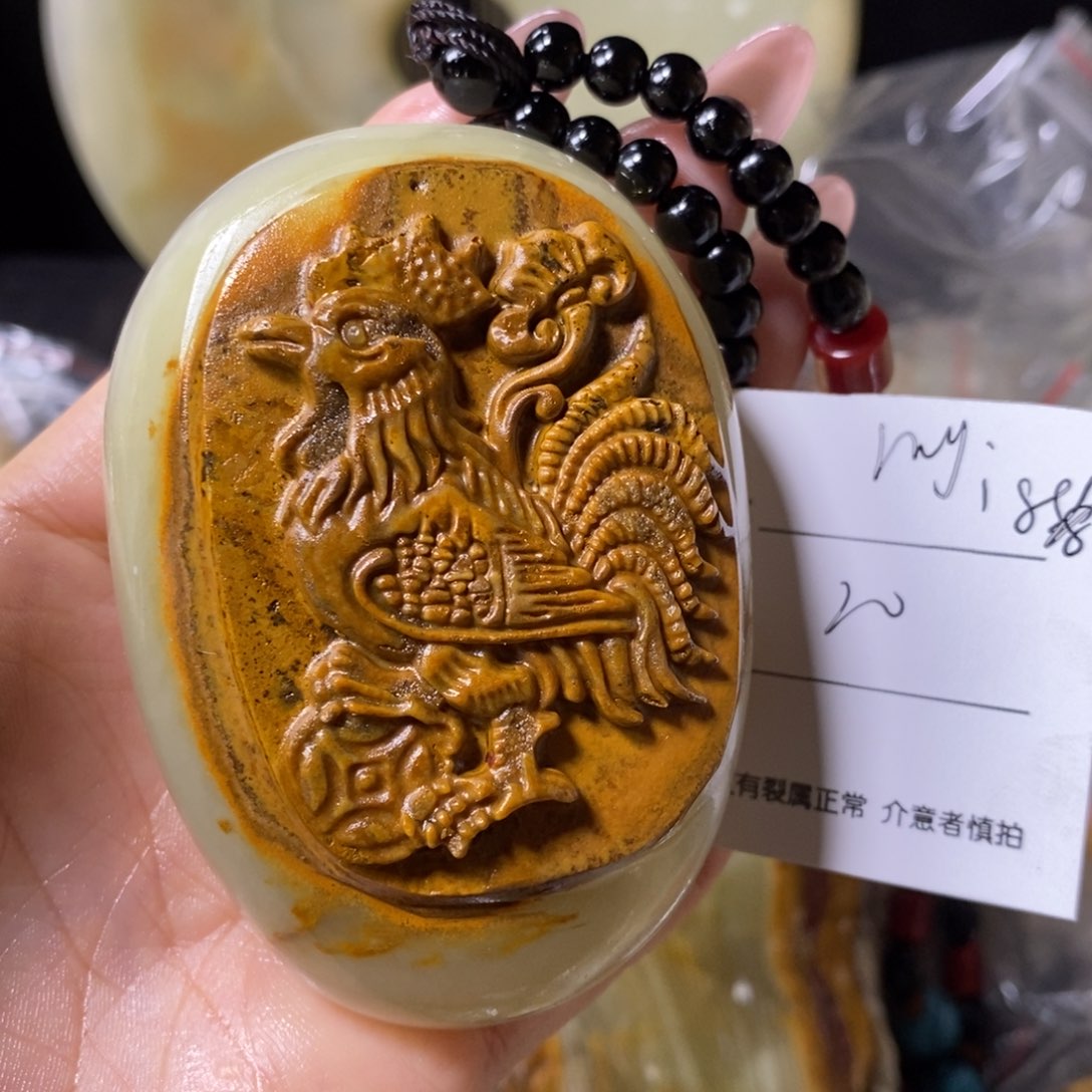 石材r****8古青石手把件