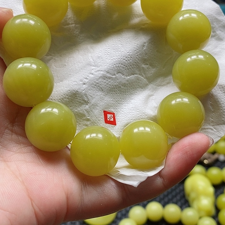 邱***焱非金属无新疆若羌黄口手串