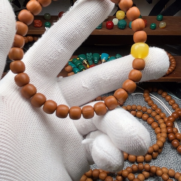 恩***记猴头核桃手串黑8文玩