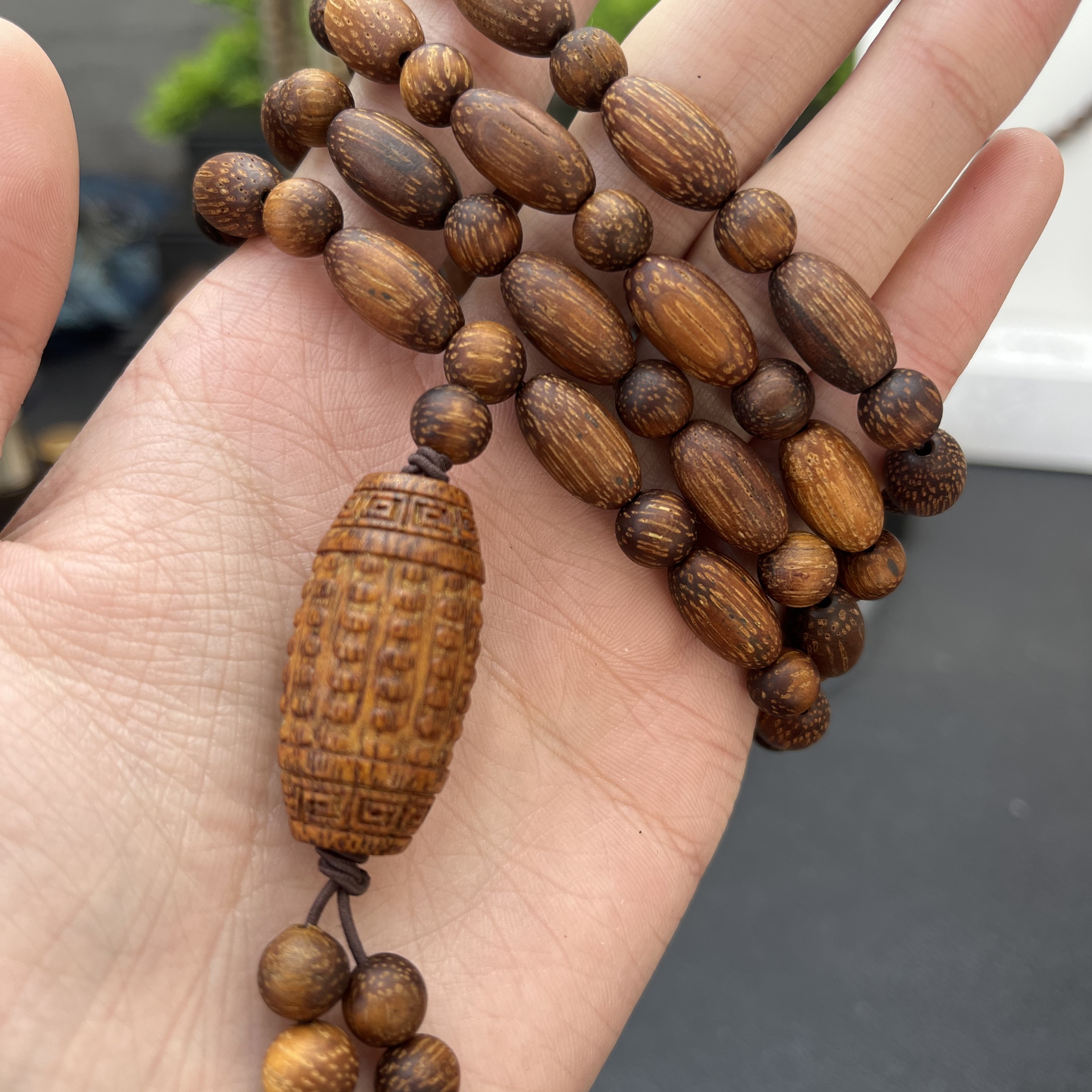 L圆圆文玩沉香木串A200