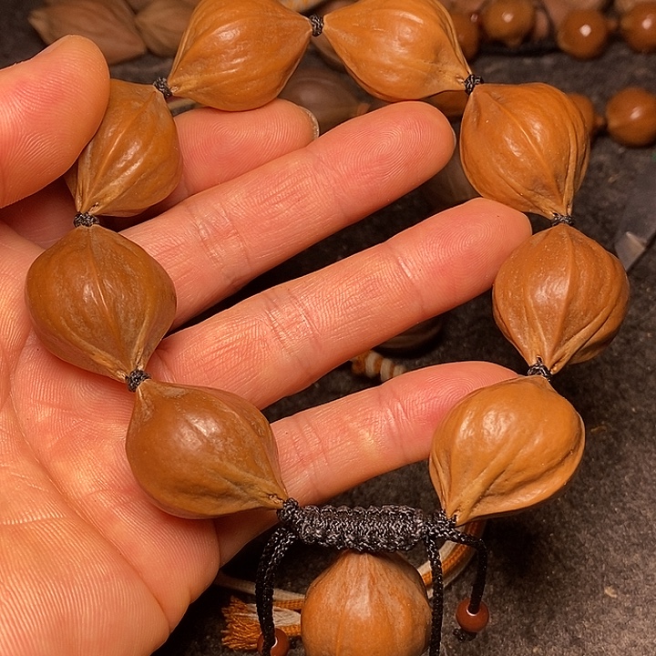 橄榄核手串2.4四花34号