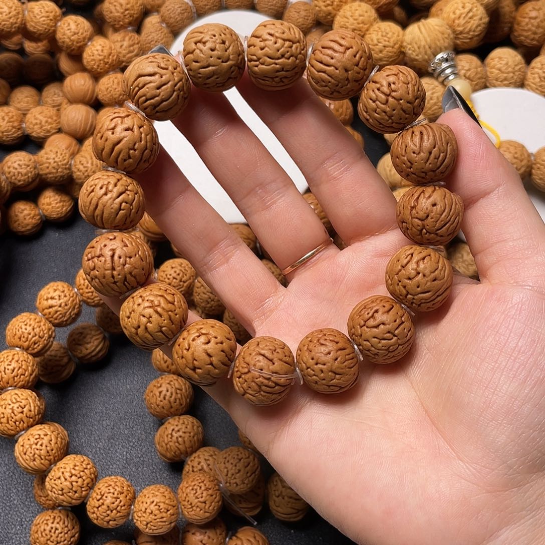 阿***祖桃核手串肉纹元宝