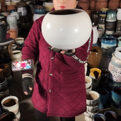 口19高22瑕疵盆子。