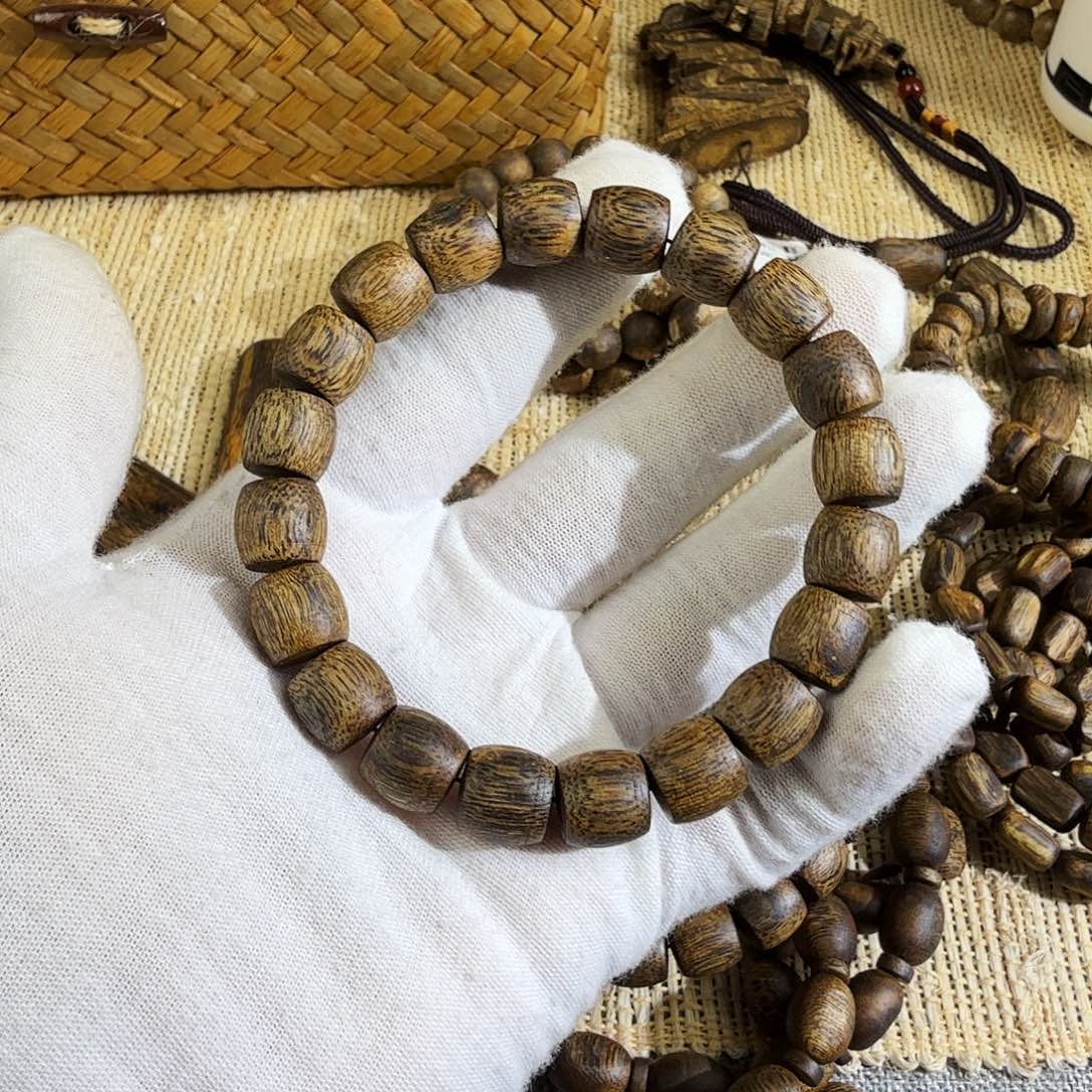 随***舞沉香碎屑沉香绿棋鼓珠老料1.1mm