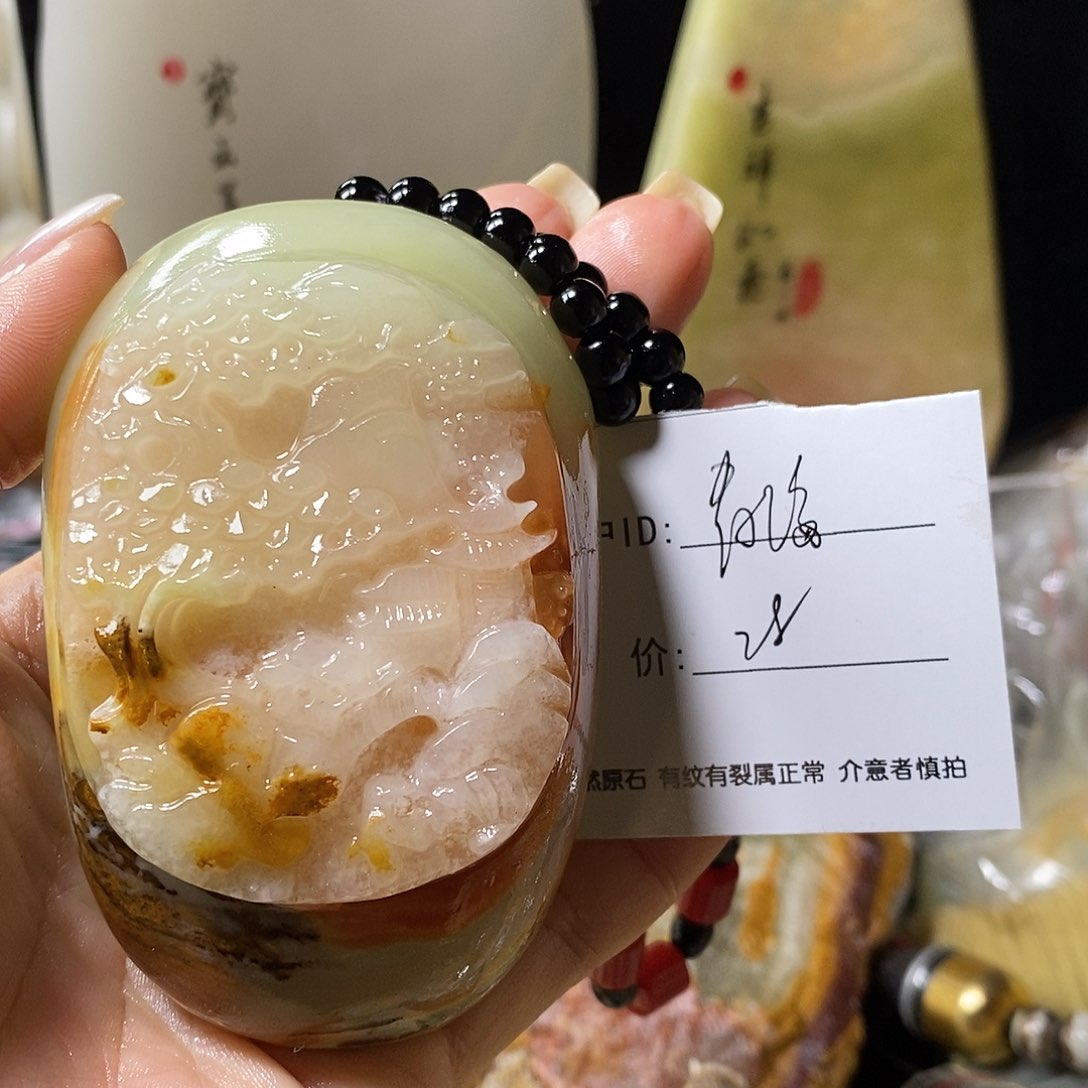 石材青**A古奇石手把件