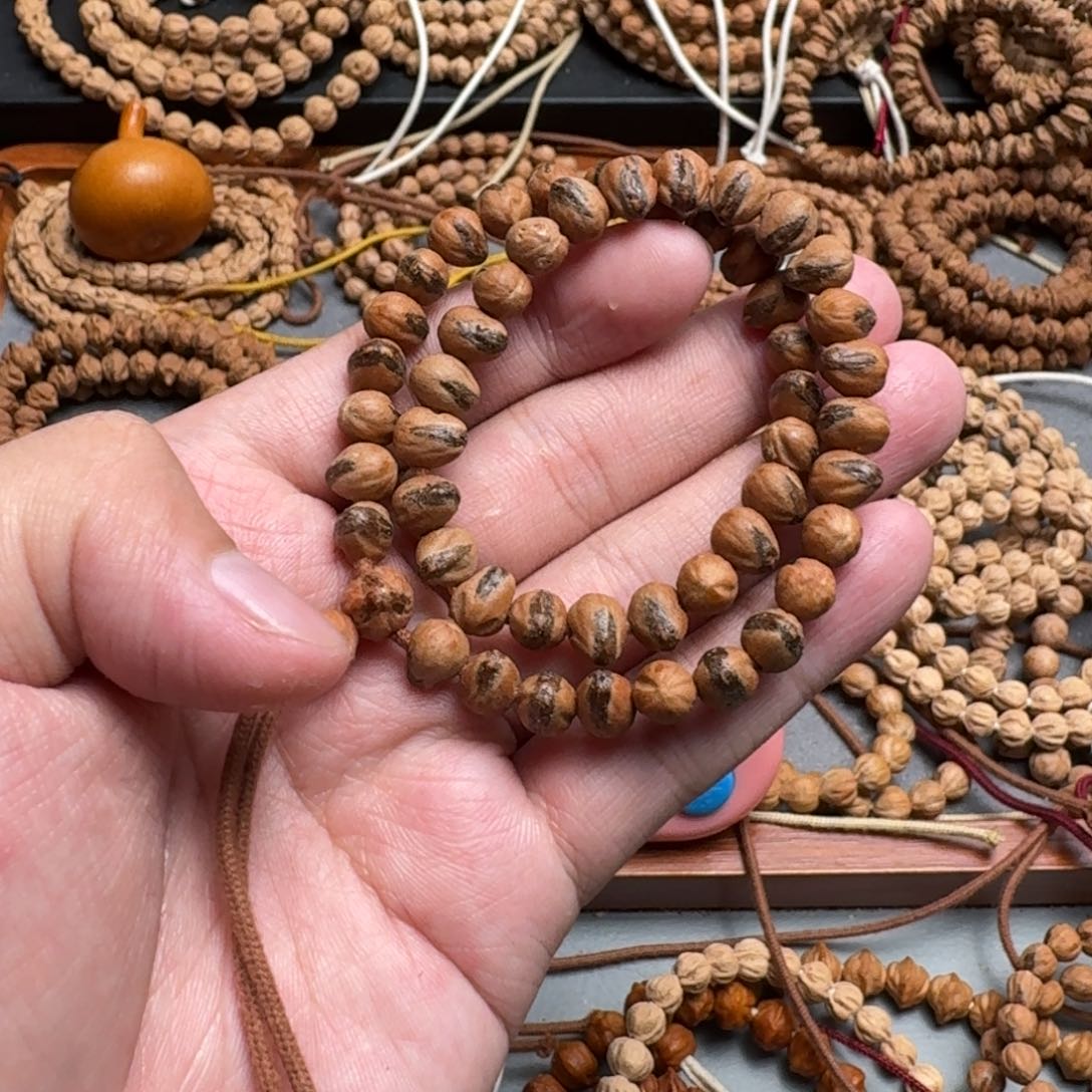 手串柏香籽/百香籽李**闪38