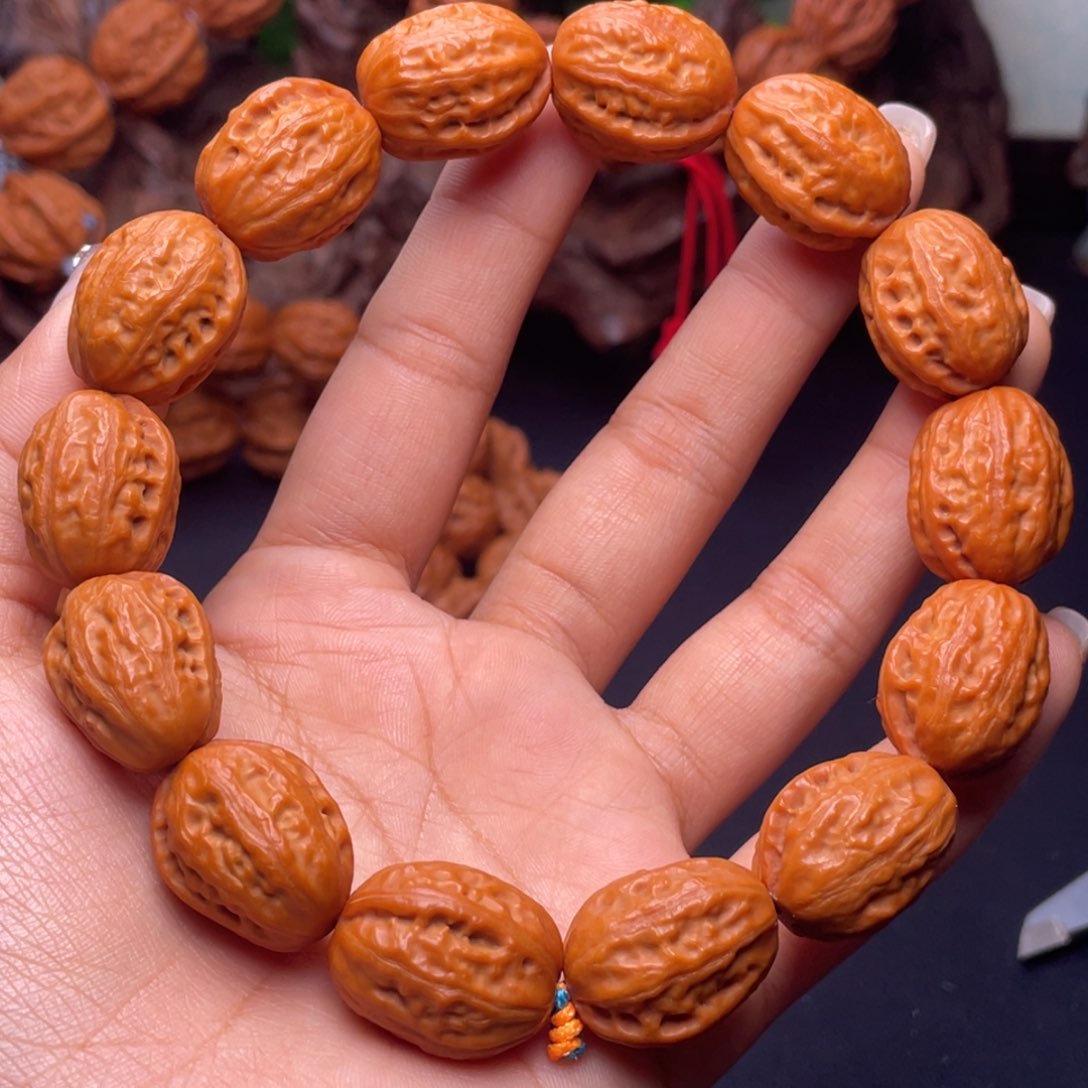 文玩核桃吊坠金丝玉枣