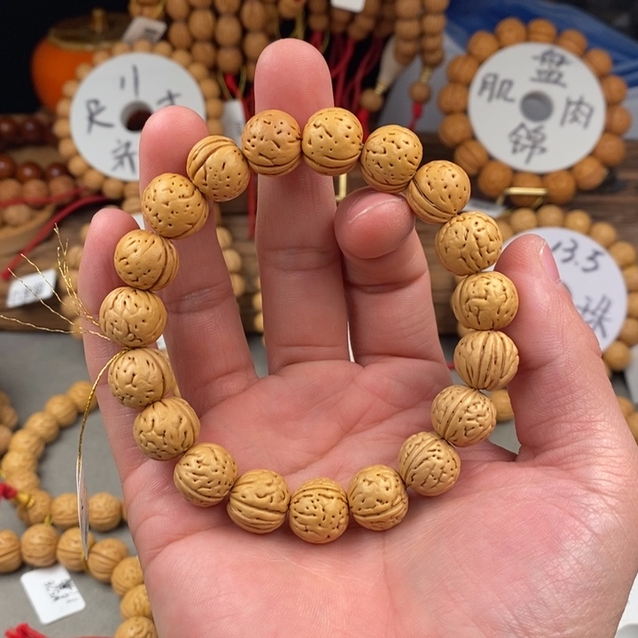 桃核手串用****5精灵13.5误差0.5之间………