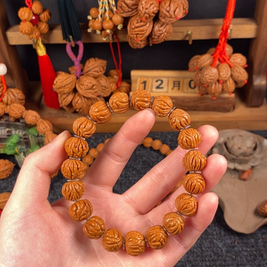 吊坠桃核桃枭手串