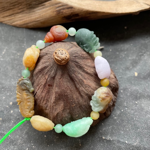 卖了拾七翡翠天然缅甸A货糯化种多宝海洋手串手持