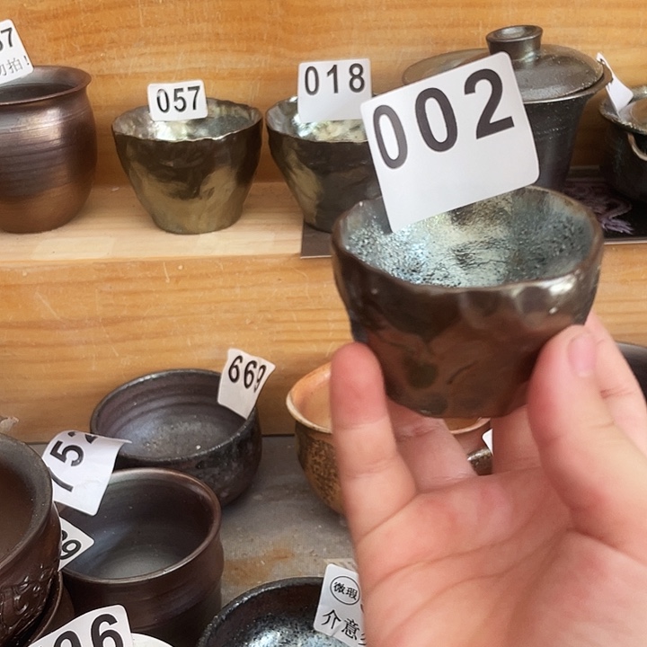 茶杯紫泥吞吞吐吐