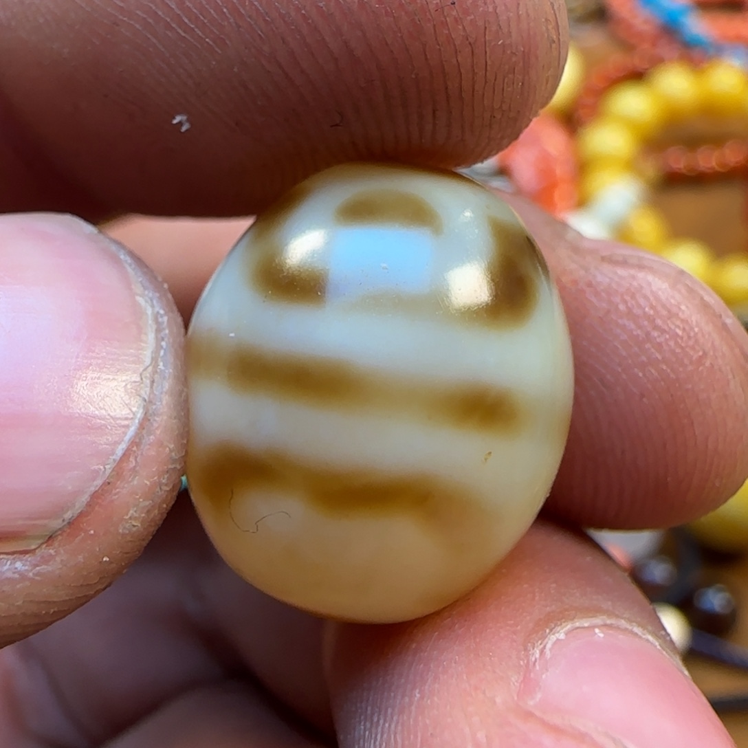 桃核吊坠拉萨市的拉萨保真