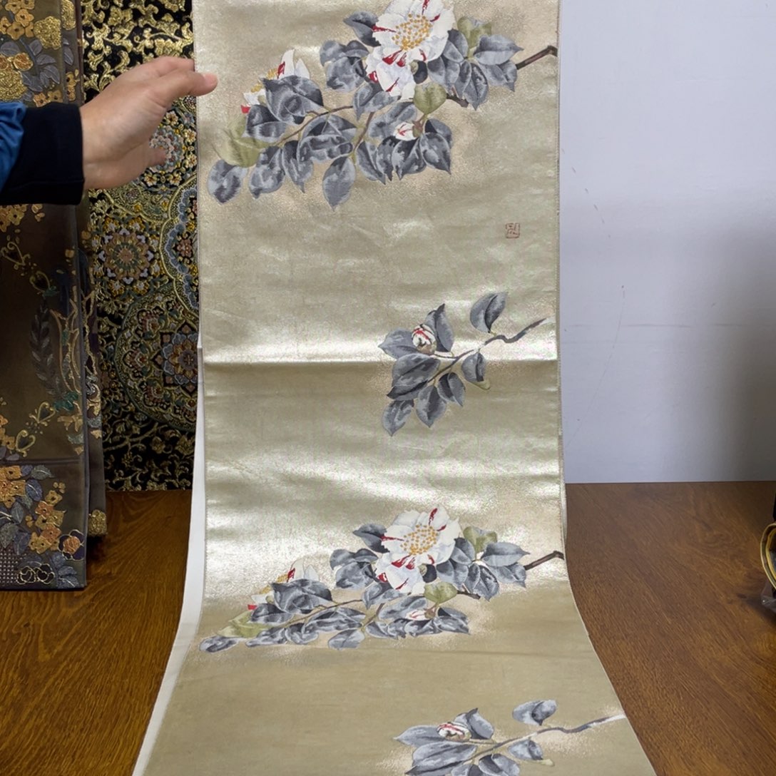 织绣有痕取画片的