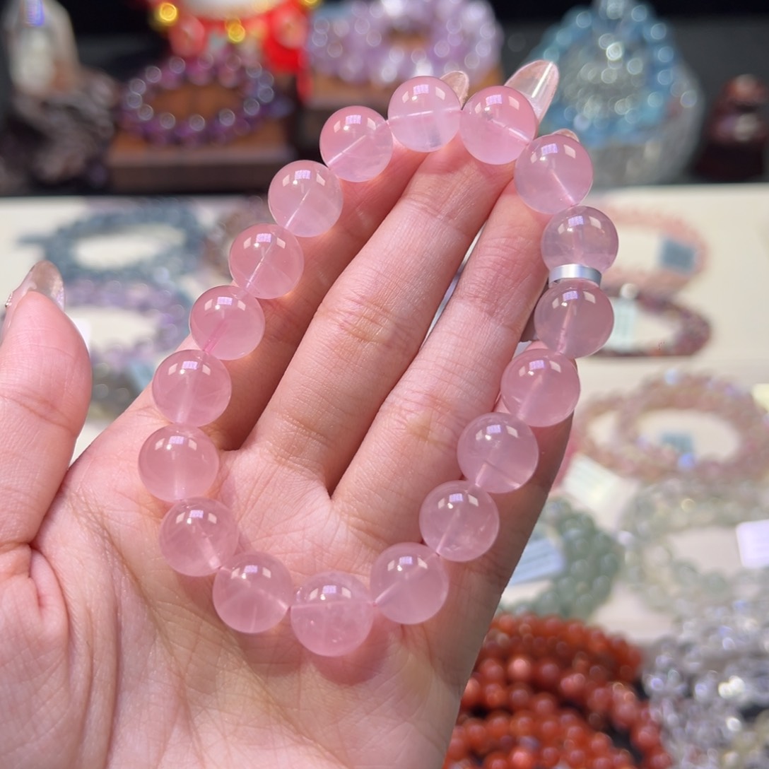 水晶手串未镶嵌11m老矿透体蜜桃粉