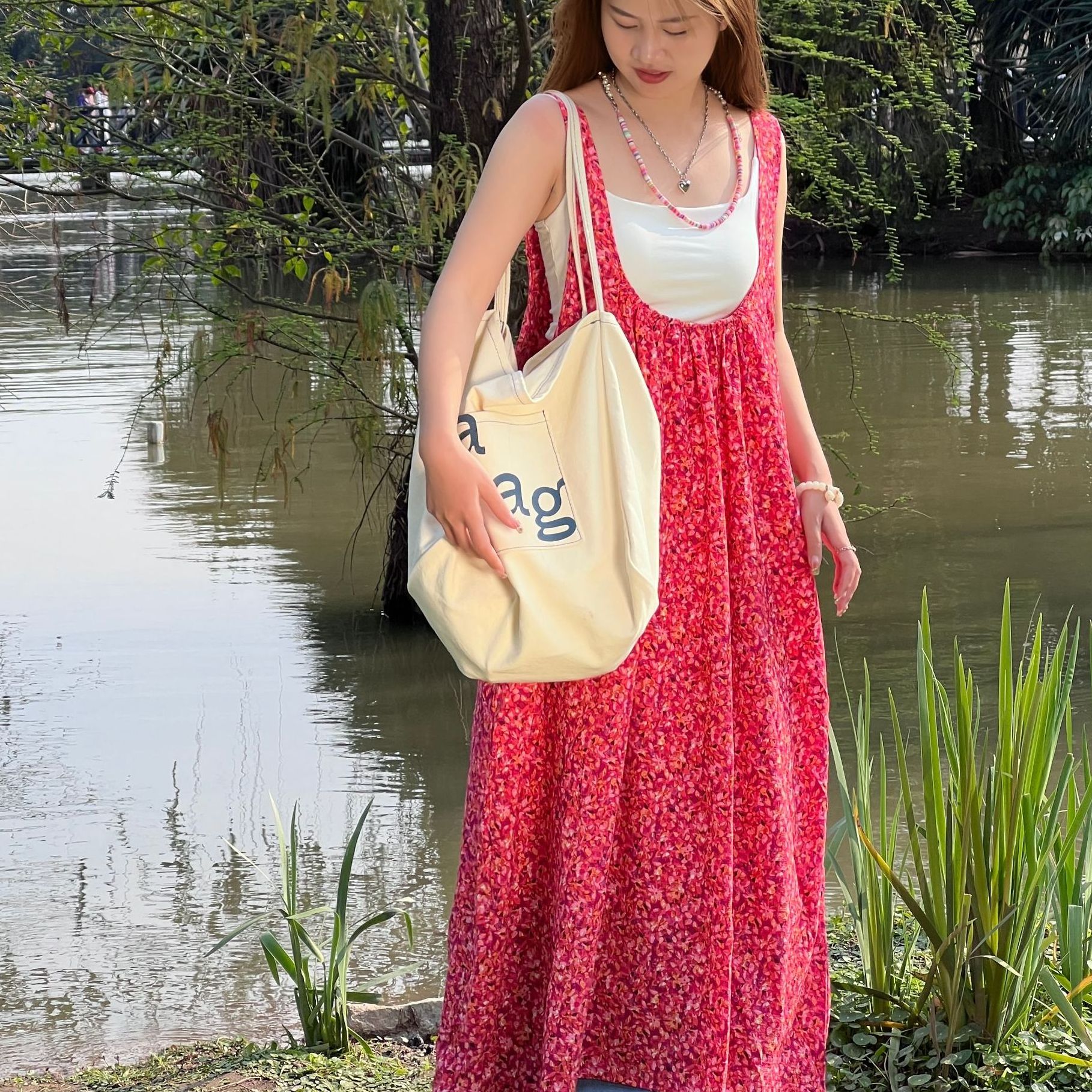 春夏新款碎花气质高级露背长款吊带裙子旅游出街衣服