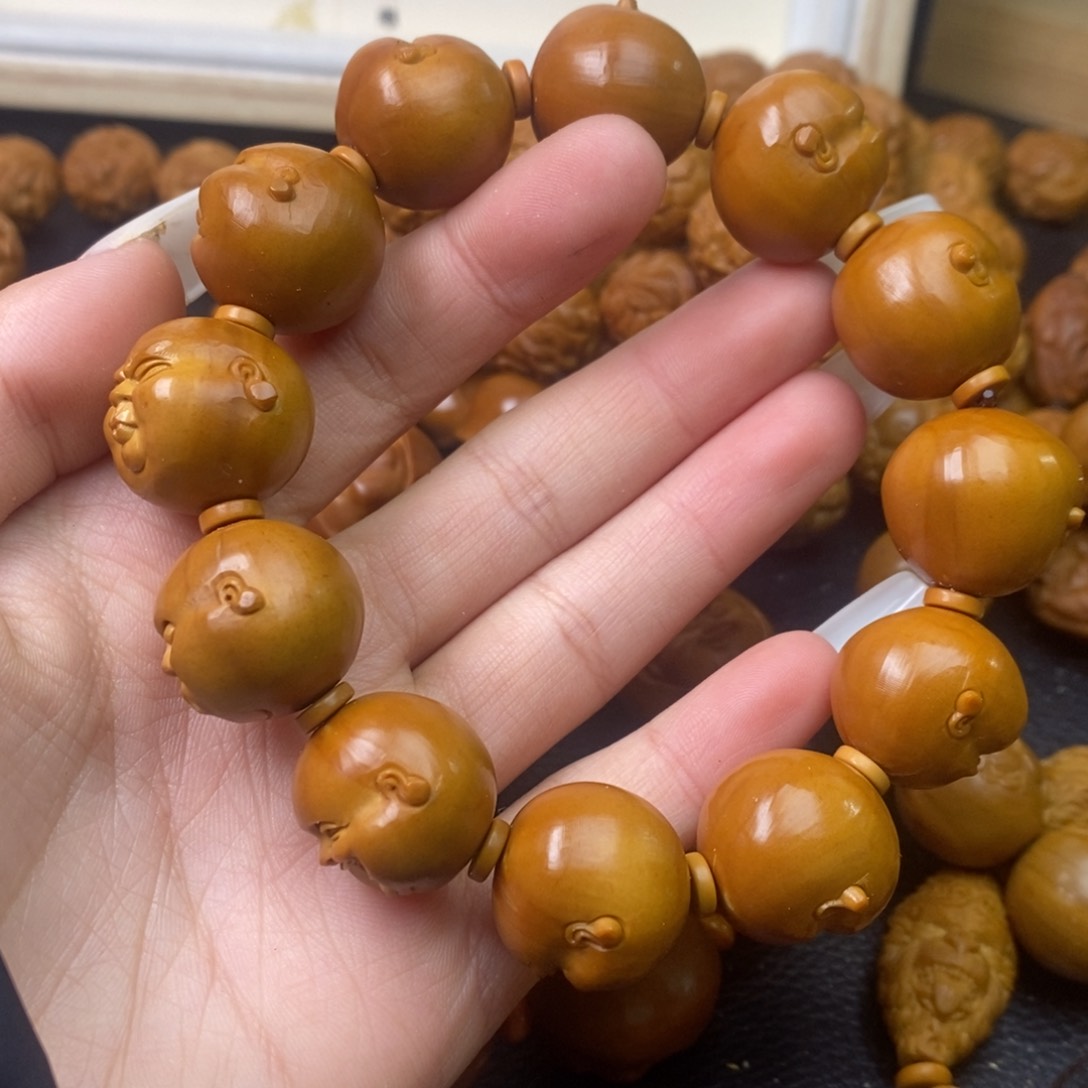 橄榄核吊坠睡**.橄榄人生百态