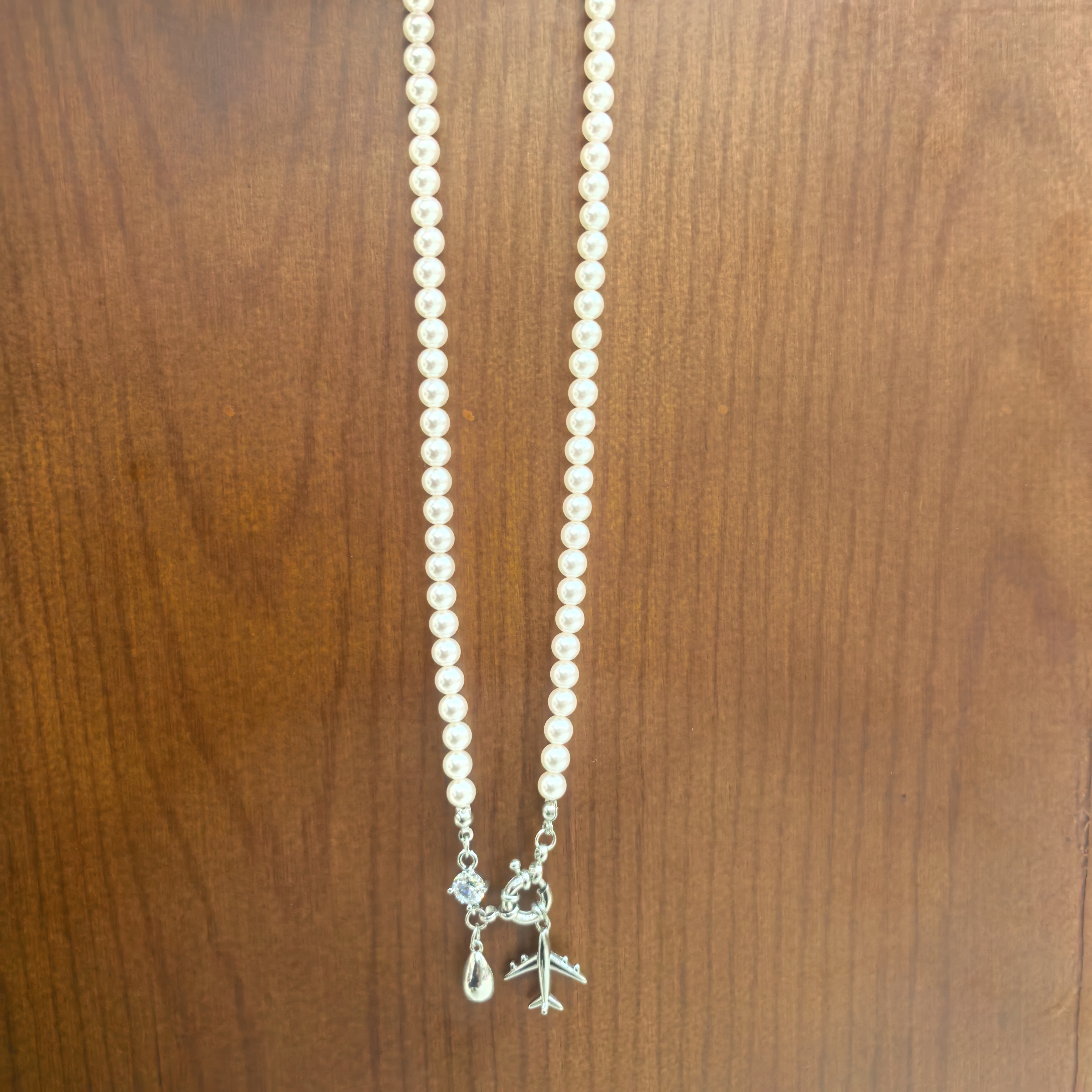 F681银色小飞机水滴施加珠项链