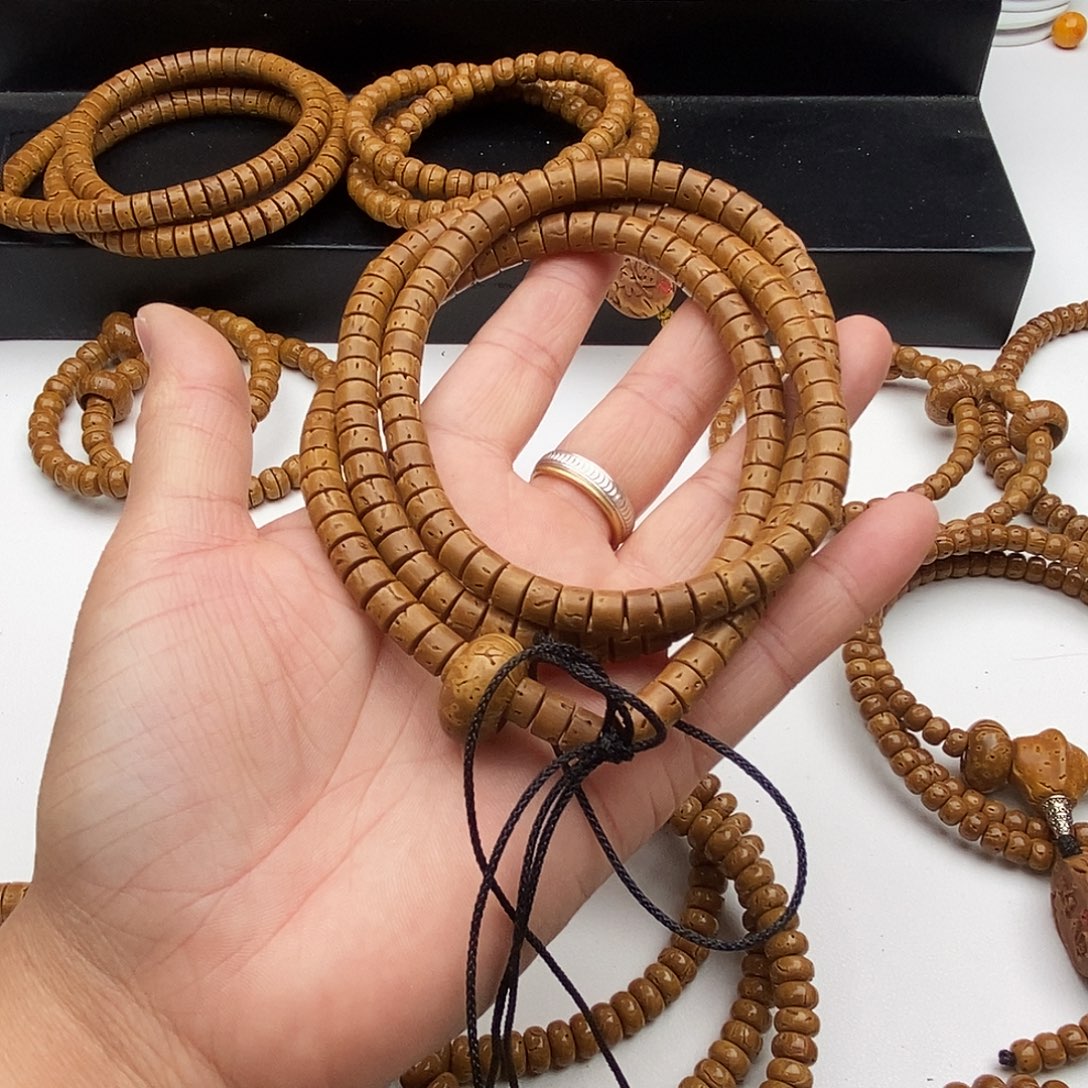 奈***何吊坠桃核桃核脖挂