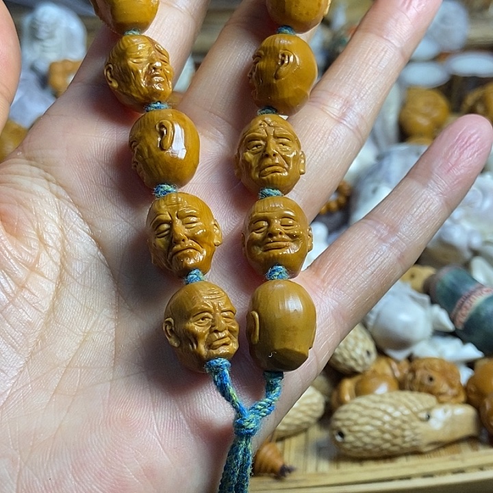 配饰橄榄雕刻一条出