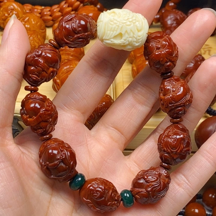 橄榄核吊坠人**世橄榄核手串