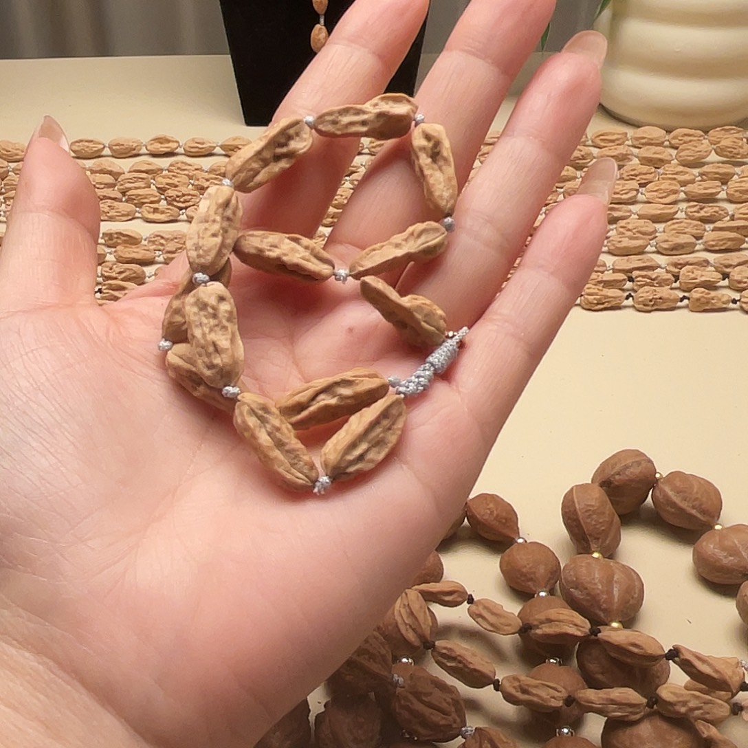 颖***儿吊坠文玩核桃异形手串