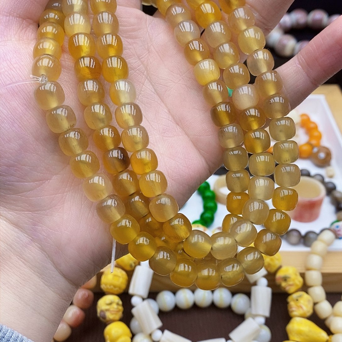 驼骨手串/手链10×9mm黑驴蹄全蜜色骨108