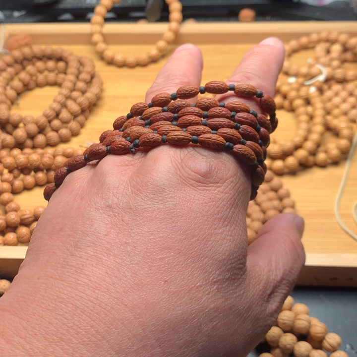 艾***思吊坠桃核野生精品小核桃散籽