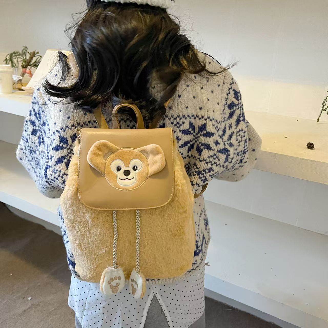 达菲抽绳翻盖款包包