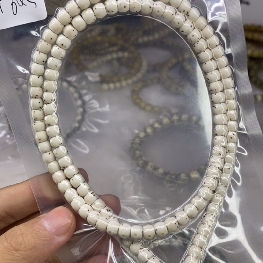 星月菩提手串星月菩提6*5直切通体三分之二留白带月