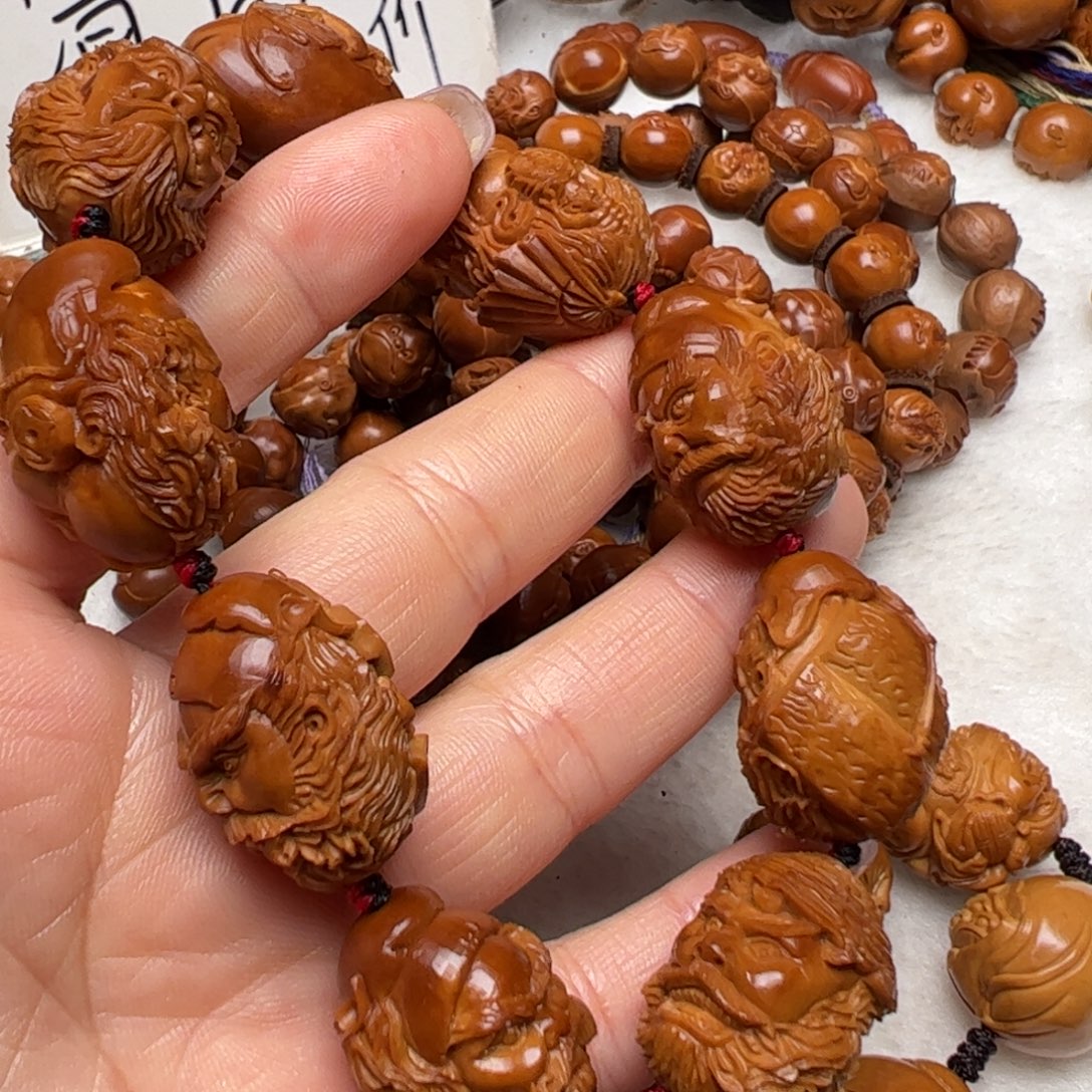 涅***。吊坠橄榄核橄榄核雕刻