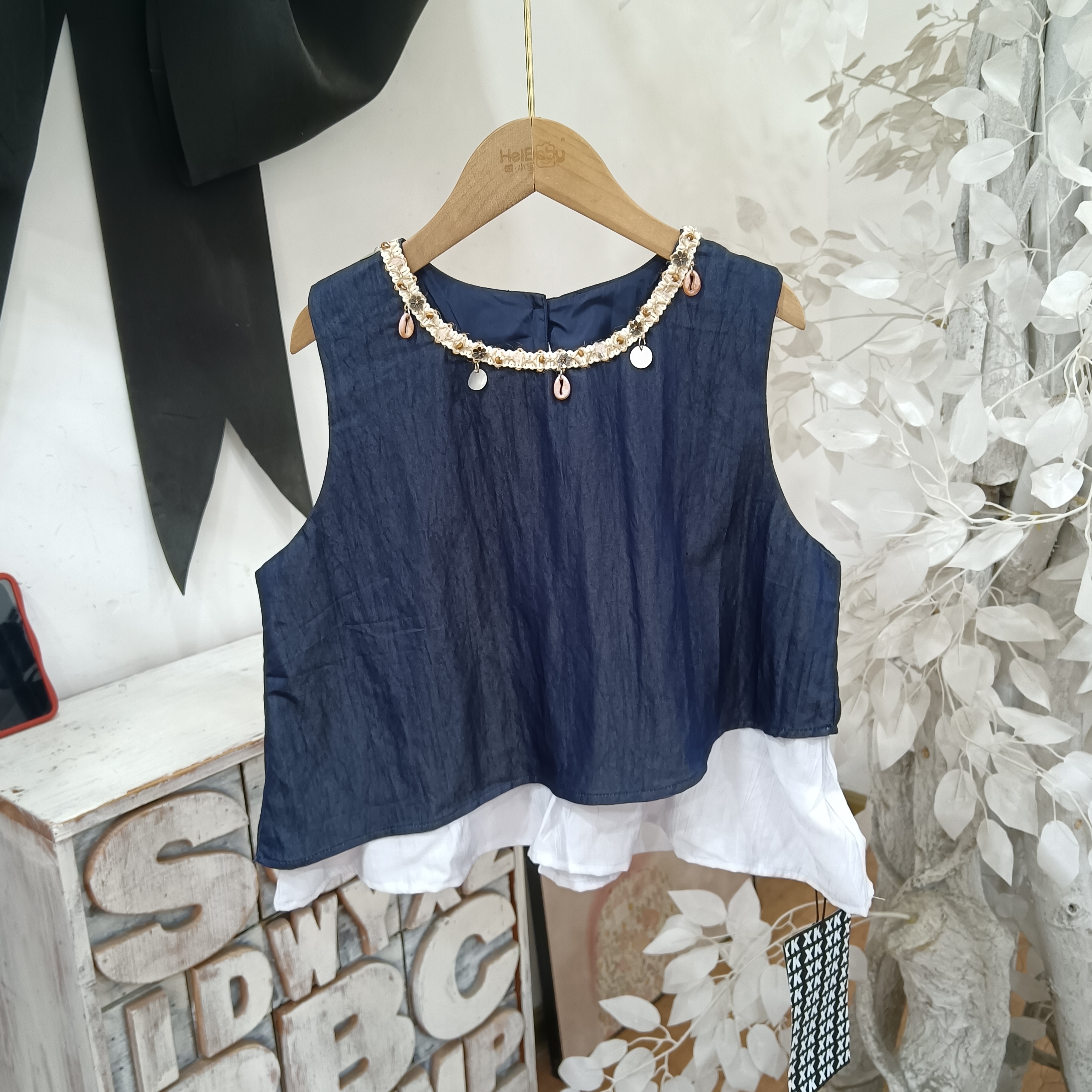 V766蓝色背心上衣/丫一