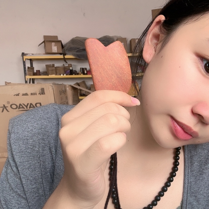 泗水砭石刮板手把件