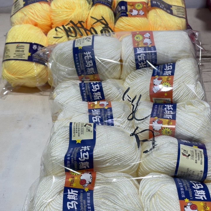 羊毛混纺乳白1进的