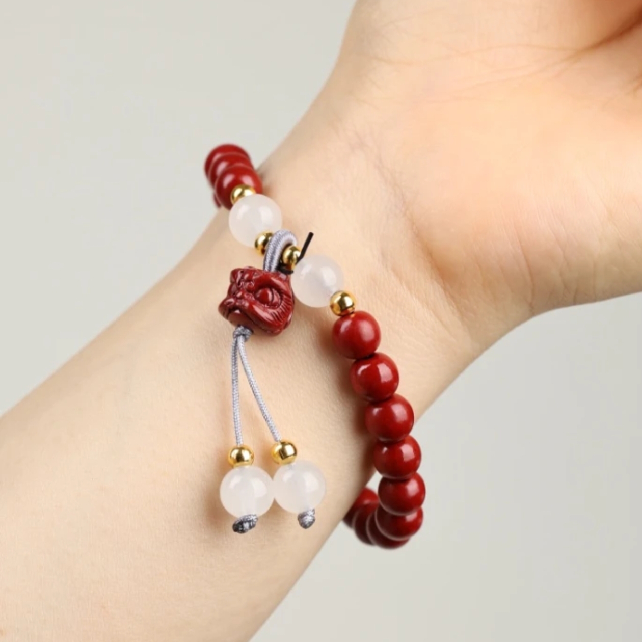 含辰砂工艺品含辰砂工艺品醒狮单圈手串（无礼盒）-302