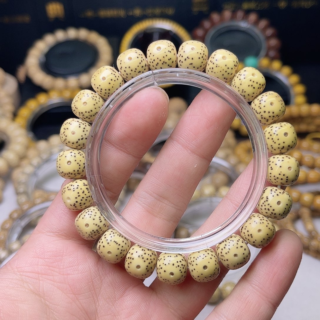 星月菩提手串11/10鸡油黄大眼睛