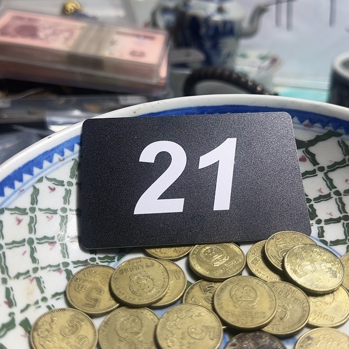 伟***铜铁合金类退市梅花硬币