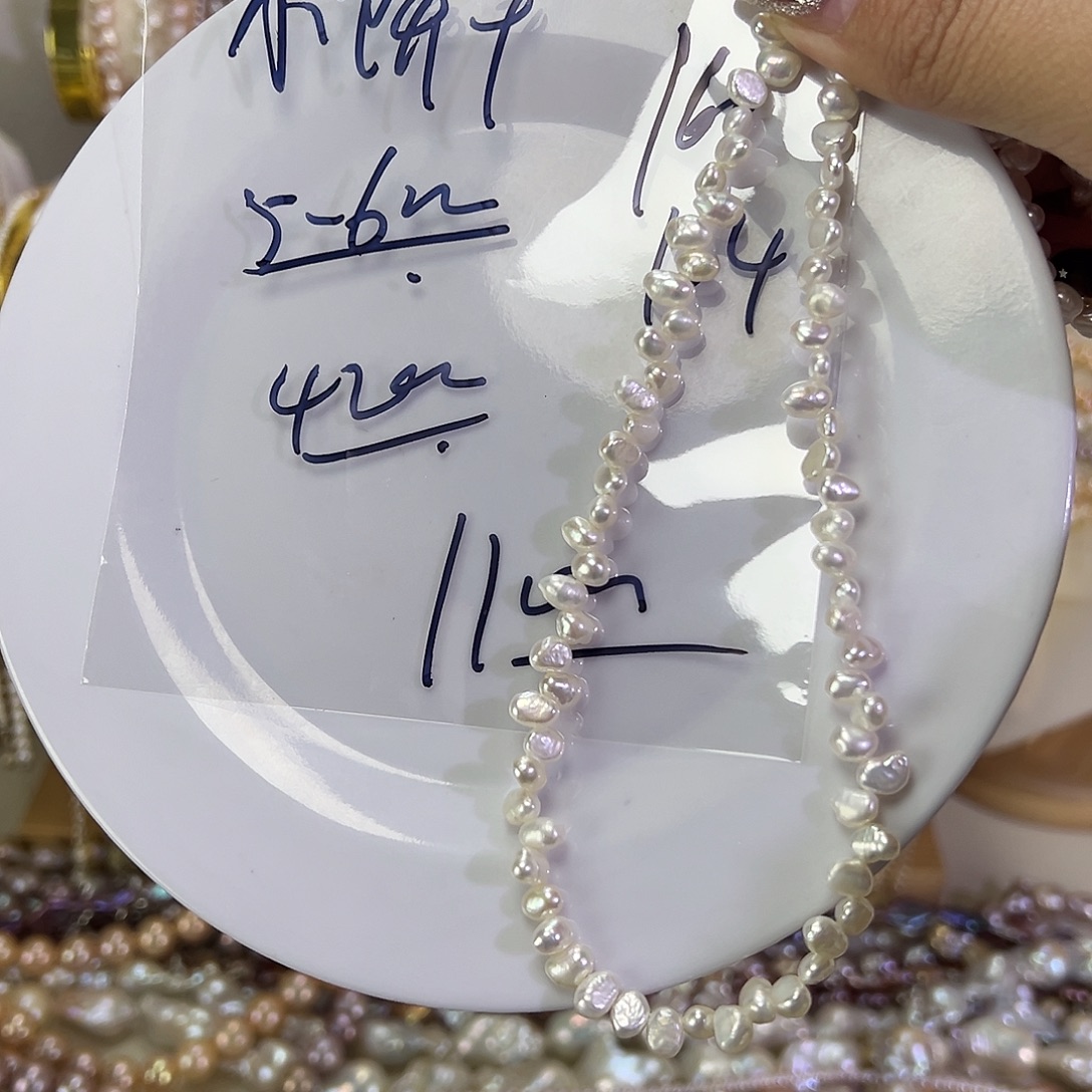 谁****手绳淡水珍珠钛钢