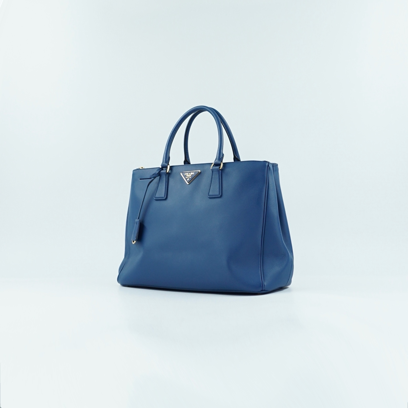 95新 Prada/普拉达 二手蓝色十字纹杀手手提单肩包K31577