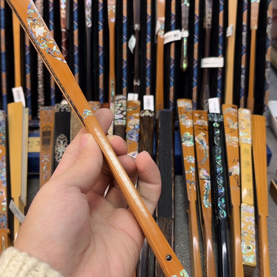 扇子老***娃纯手工制作的