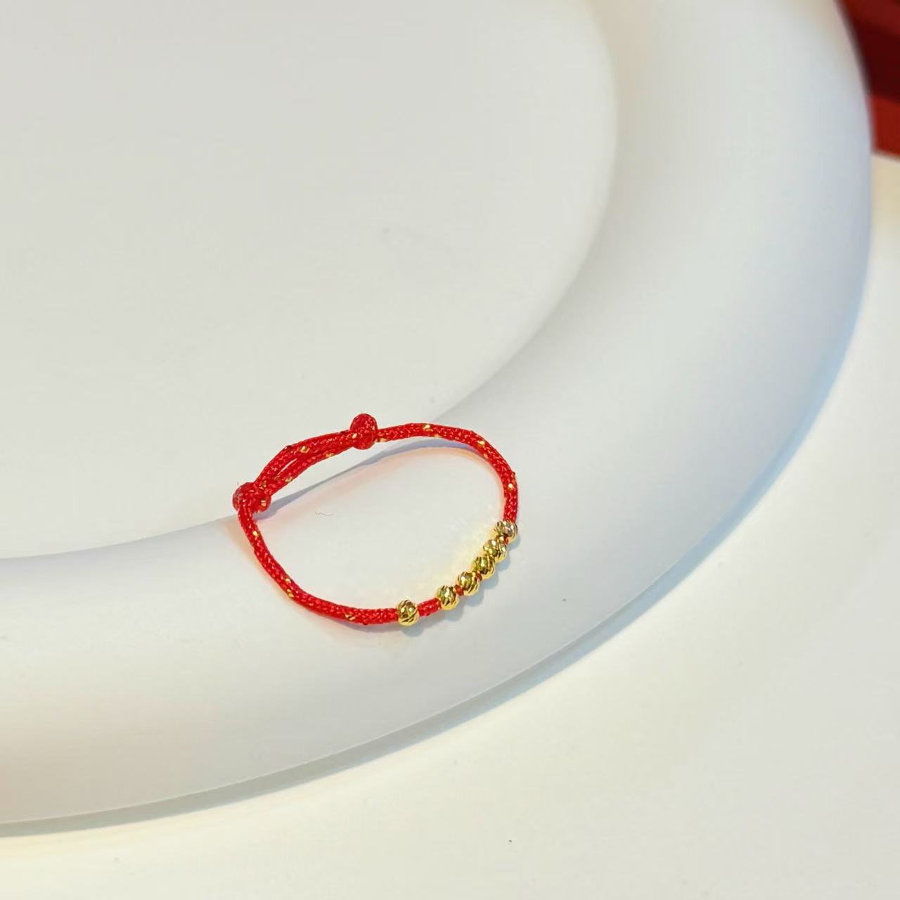 18K金2mm左右珠珠戒圈红绳HNZ10487