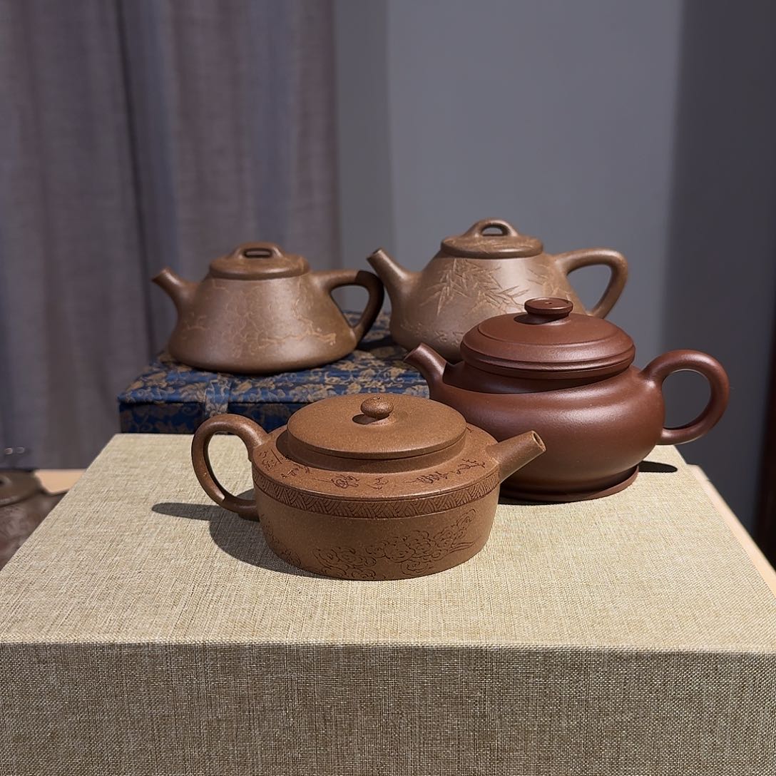 紫砂茶壶摄****城紫砂壶茶具手工制作的话