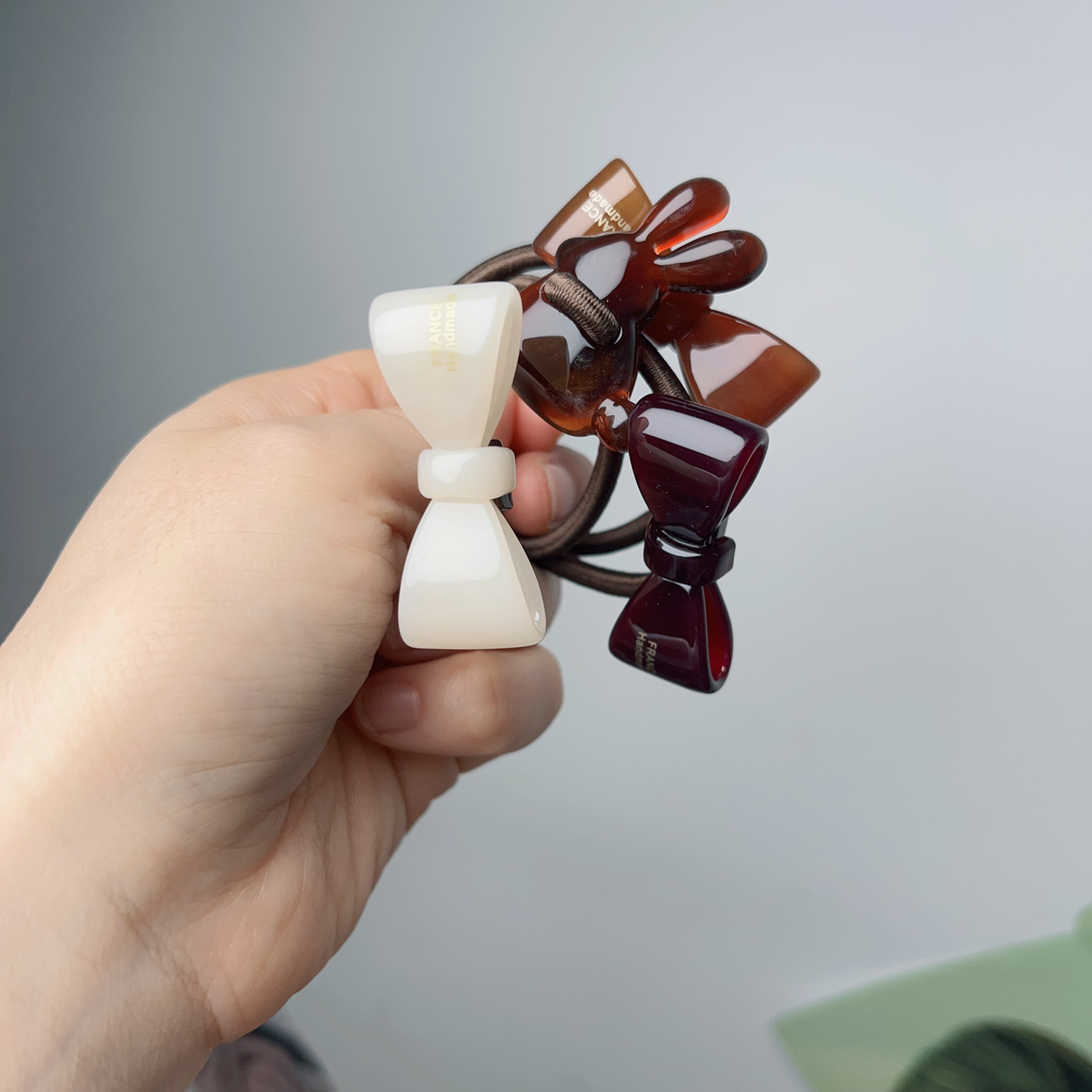 醋酸外贸小号蝴蝶结皮筋（产品无完美）