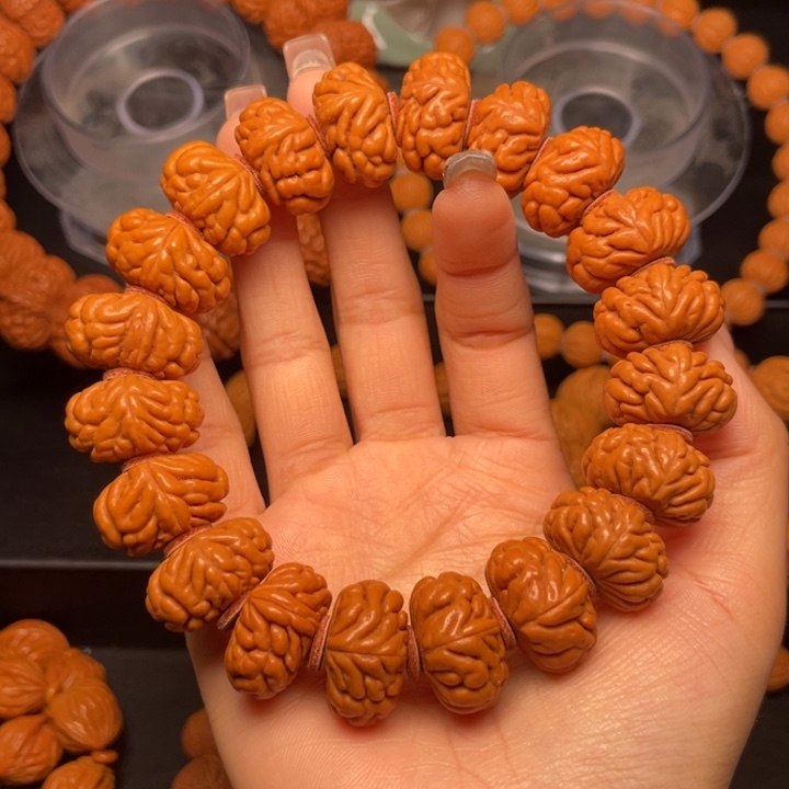 桃核手串21尺寸飞碟豹子头手串（16号链接）