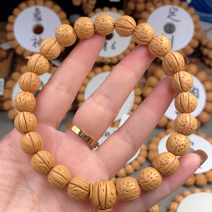 桃核手串金蝉子11,5A抛光板误差0.5