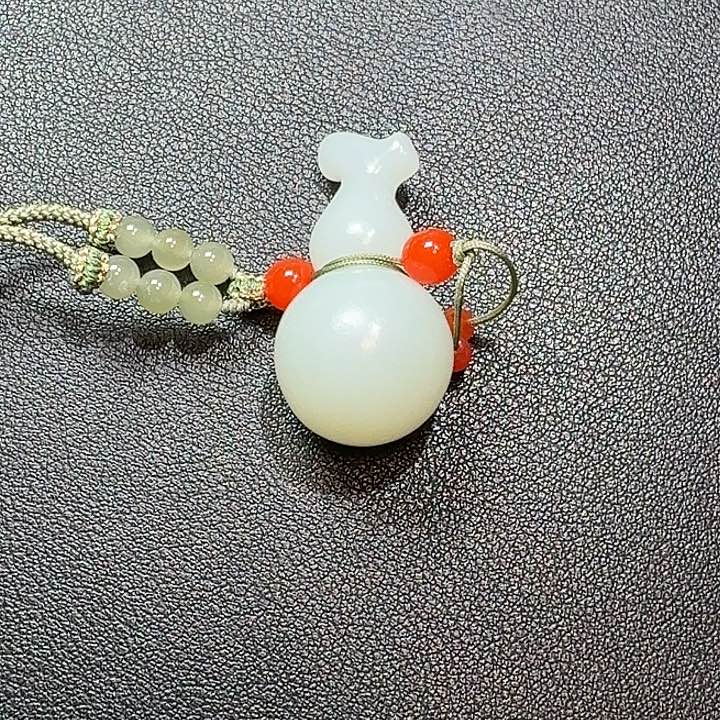 陌***。和田玉未镶嵌颈饰